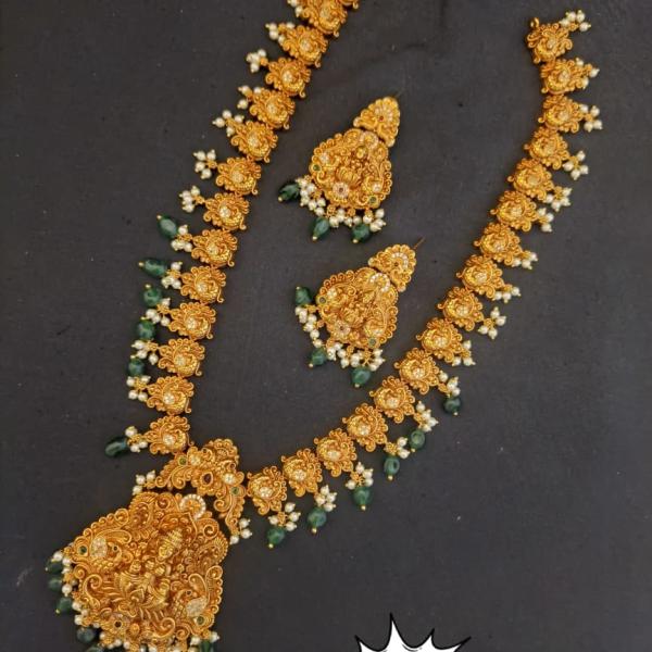 Antique Matte Gold Goddess Lakshmi Temple Long Haram Set with Emerald Green Bead Drops
